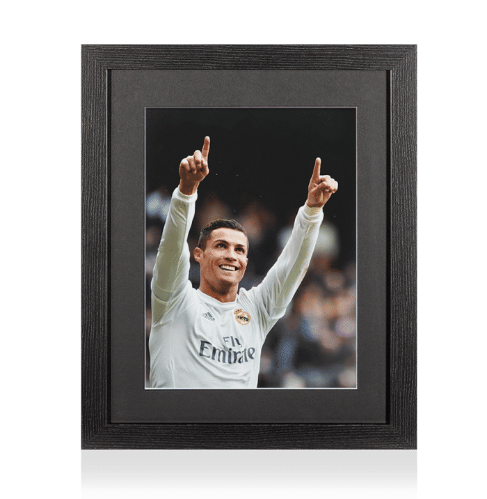 Cristiano Ronaldo Photo In Black Wooden Frame: Pointing to the stand Real Madrid (unsigned)